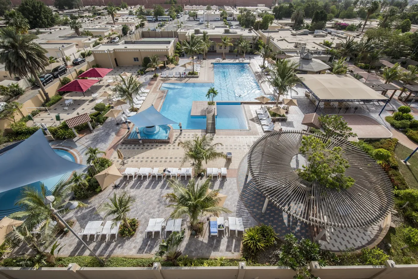 Aerial overview of the resort pools and pavilions