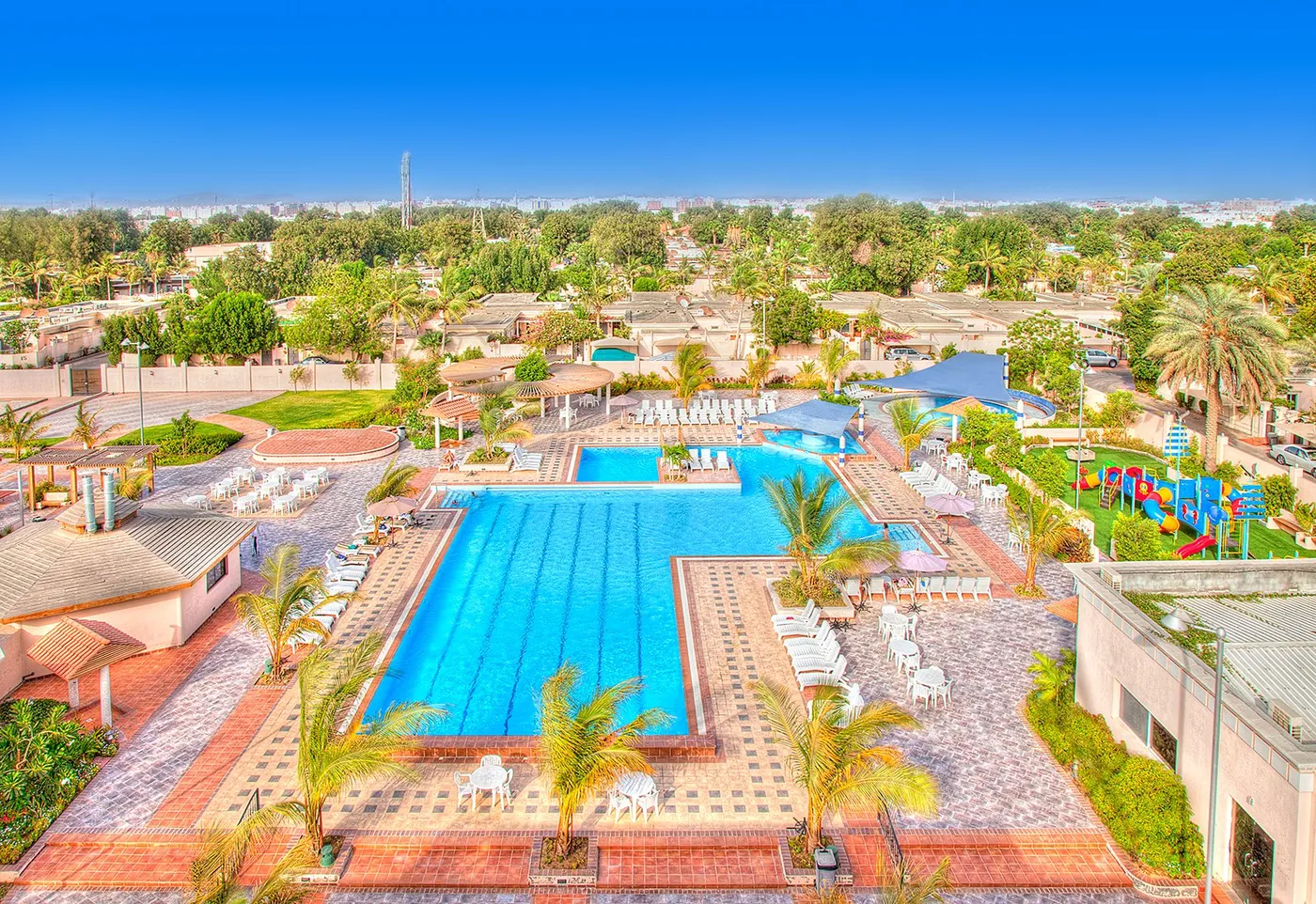 Aerial view of Sharbatly Village pools and grounds